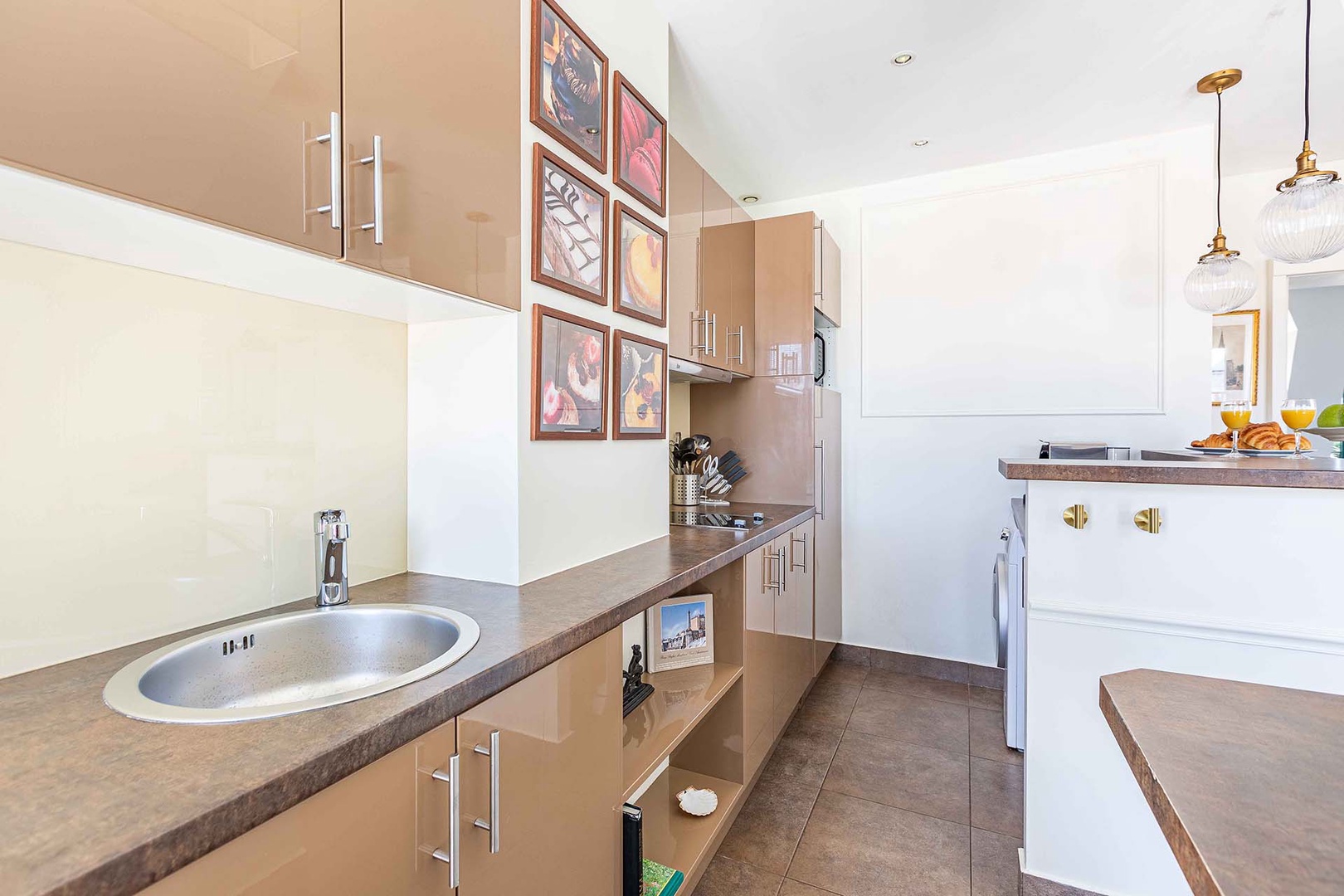 The kitchen is fully equipped and there is plenty of workspace.