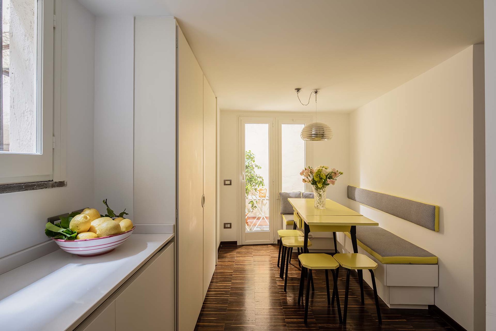 Large kitchen has a built in dining nook.