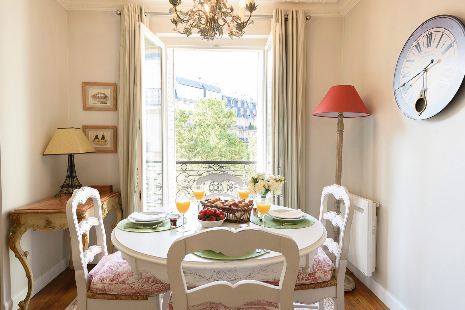 French windows and beautiful views continue in the dining area.