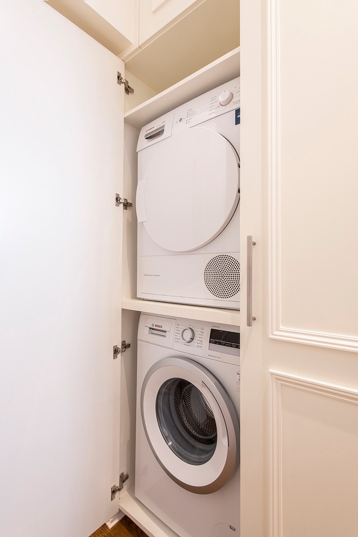 Separate washer and dryer located in bedroom 3.