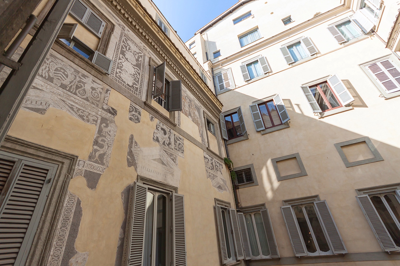 Inside the courtyard, Renaissance murals have been restored.