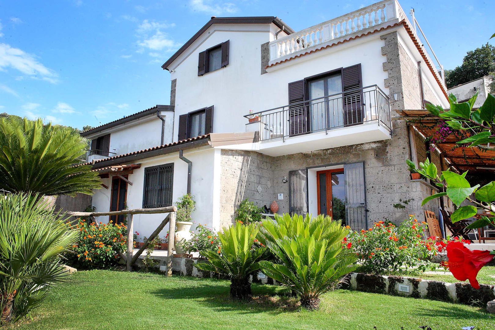 Enjoy views from the balconies and upper level terrace.