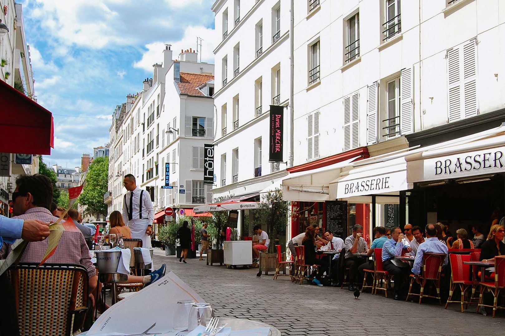 Enjoy the sights and sounds of Rue Cler market steet.