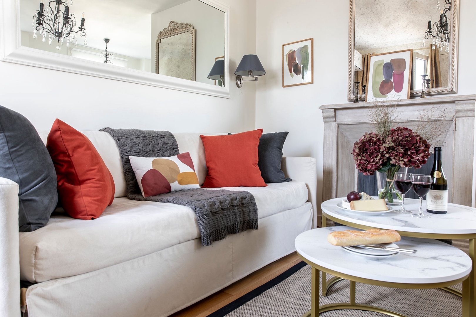 Large mirrors reflect the light in this upper level apartment.