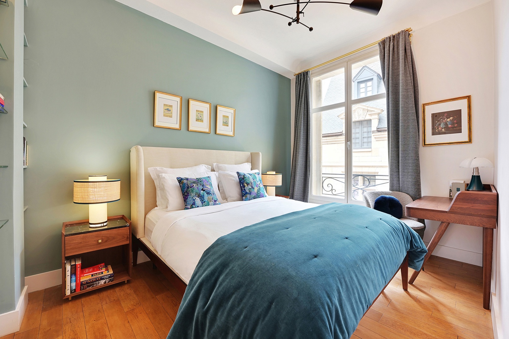 Bedroom 2 is decorated in beautiful blues.