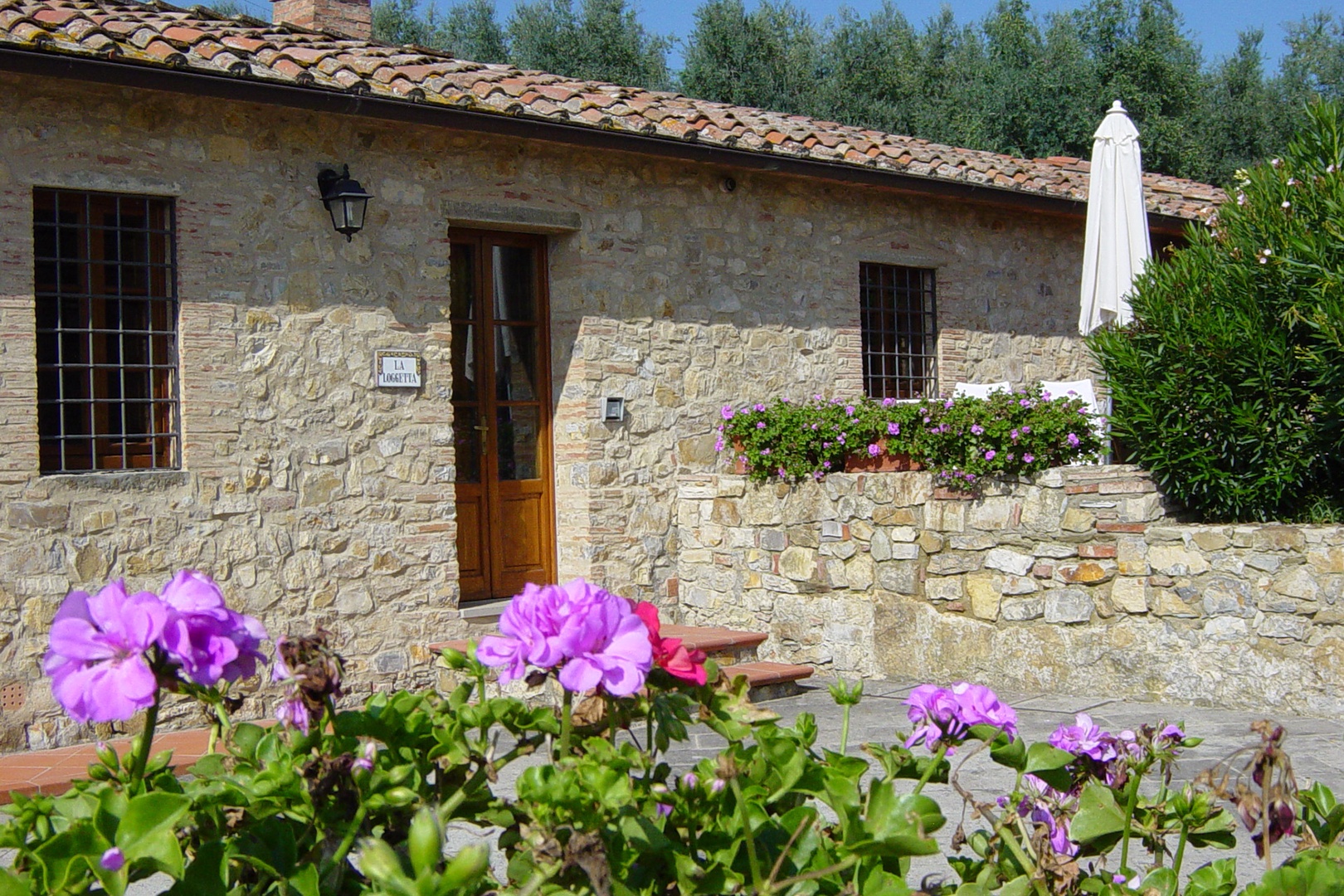 Loggetta is a cottage with one bedroom and one bath on two levels.