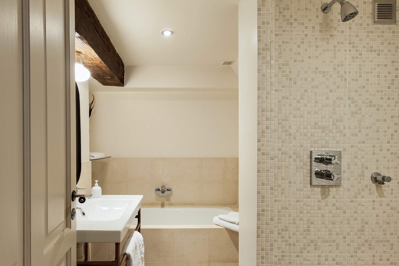 Modern conveniences mix with original features in the bathroom.