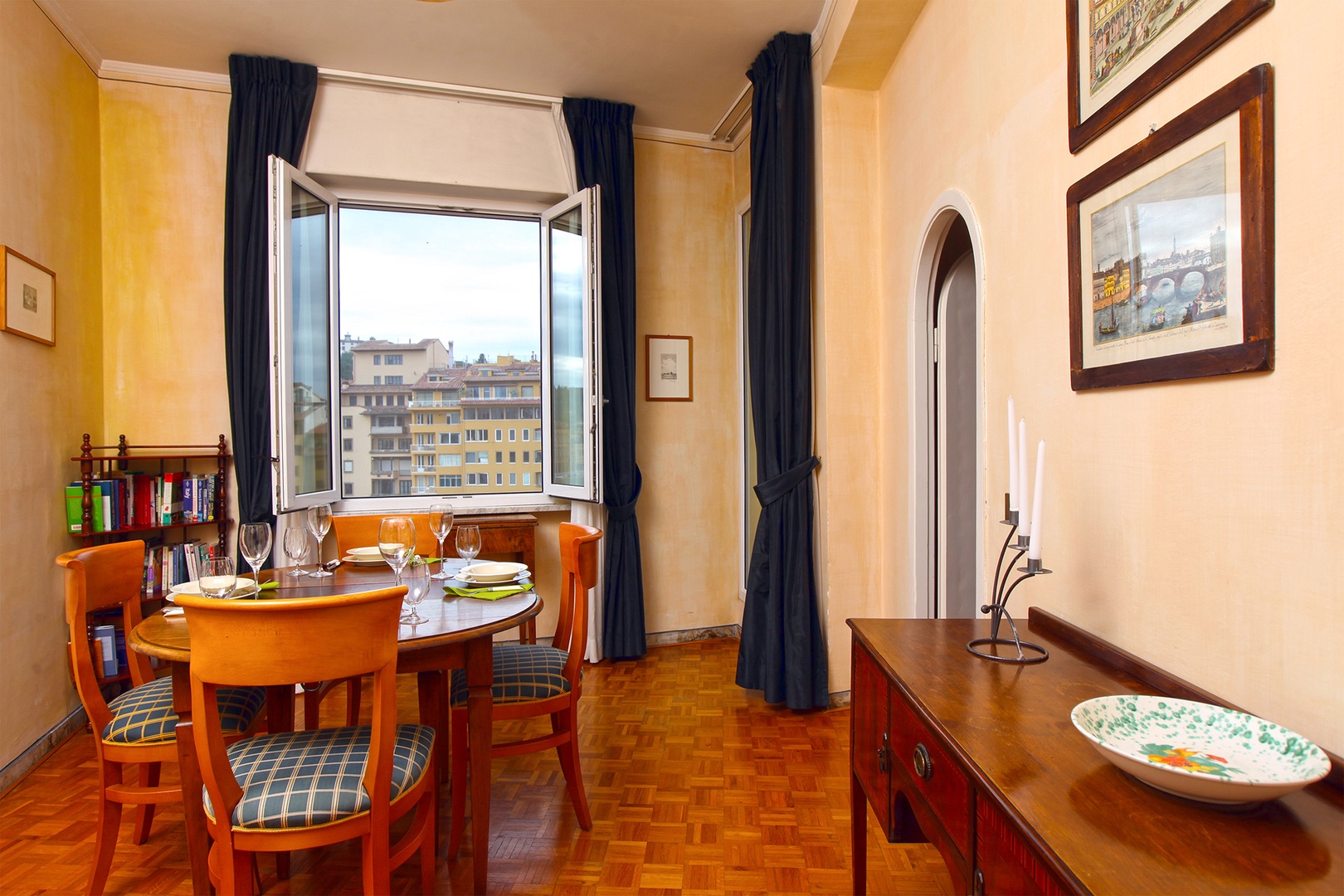 Dining room also has views out to the Arno river and terrace.