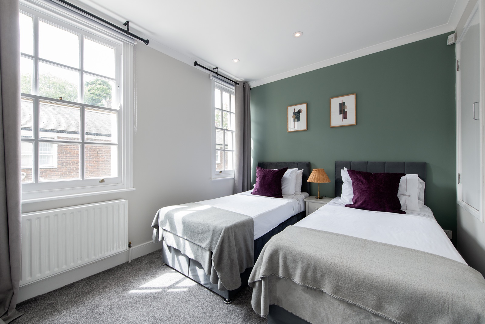 Bedroom 2 is beautifully decorated with serene colors.