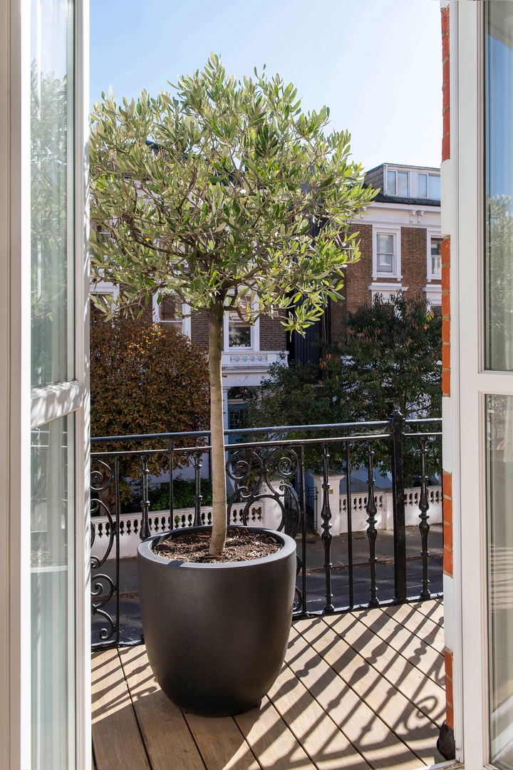 Views of  the row houses in the neighborhood from the balcony.