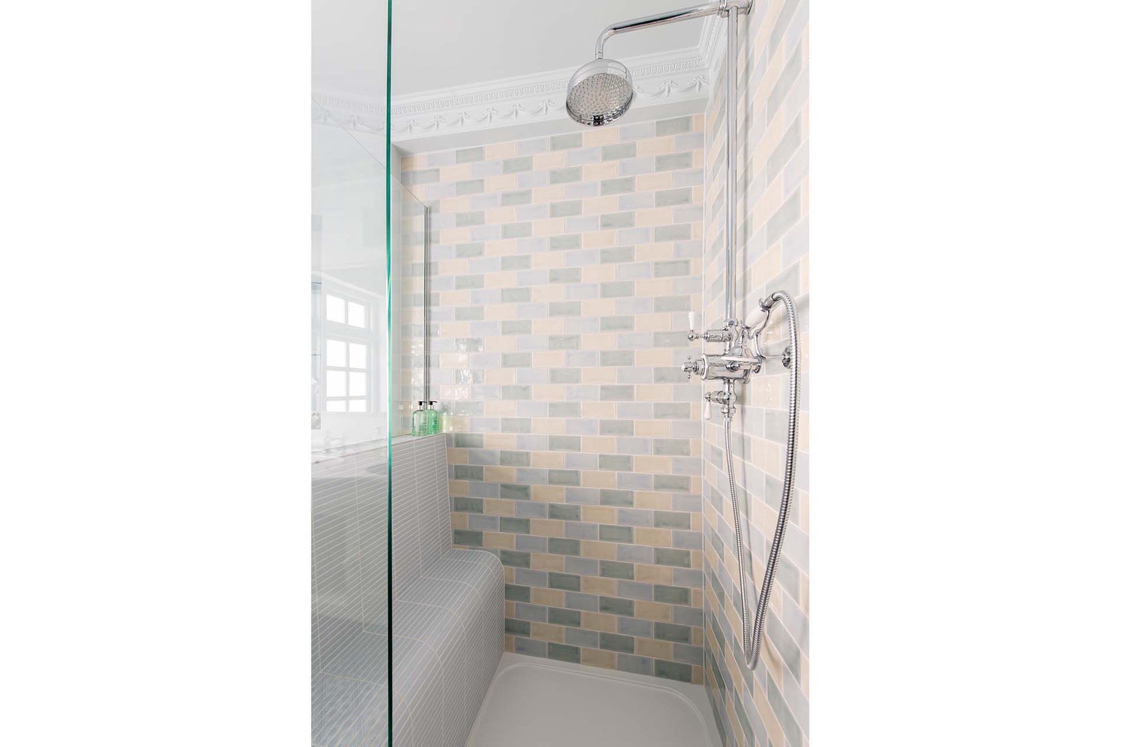 Beautifully tiled shower in bathroom 1.