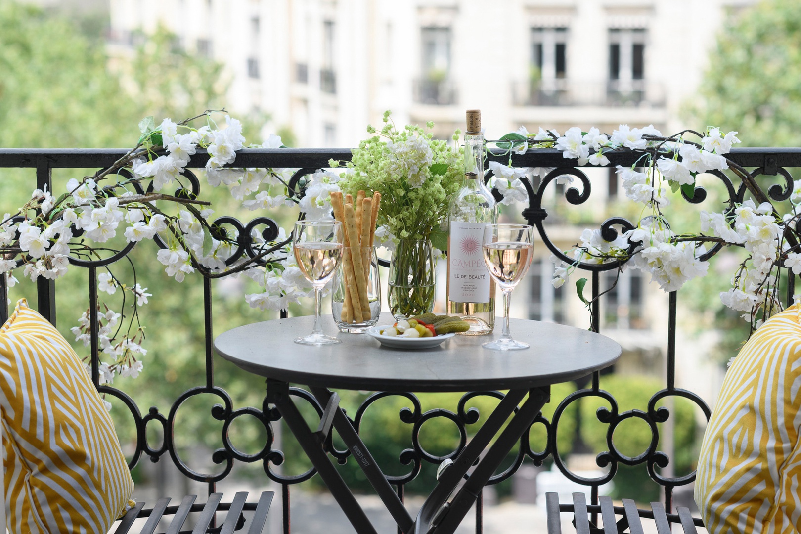 Enjoy apéro on the sunny wraparound balcony.