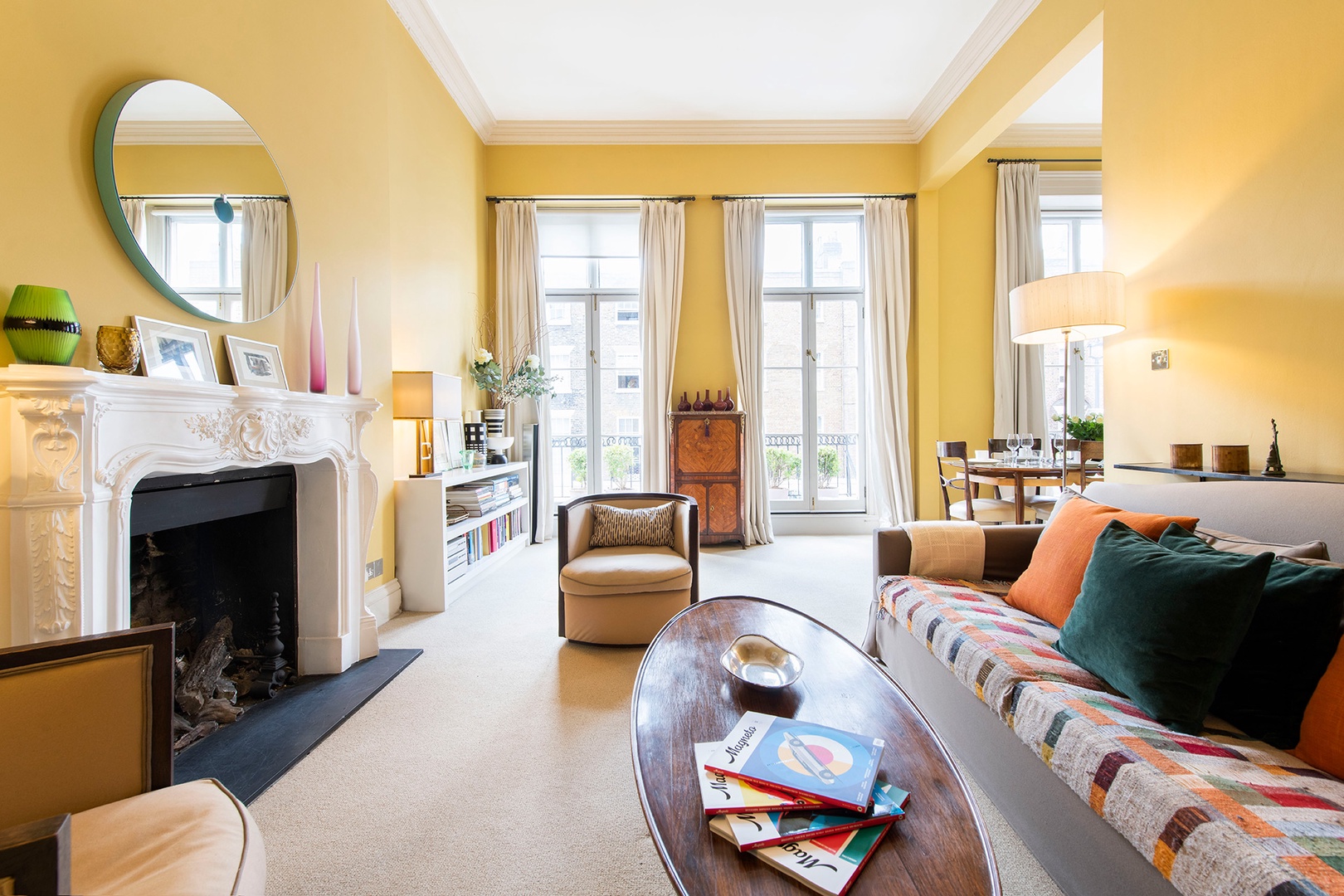 Gorgeous living room with large doors and step-out balcony