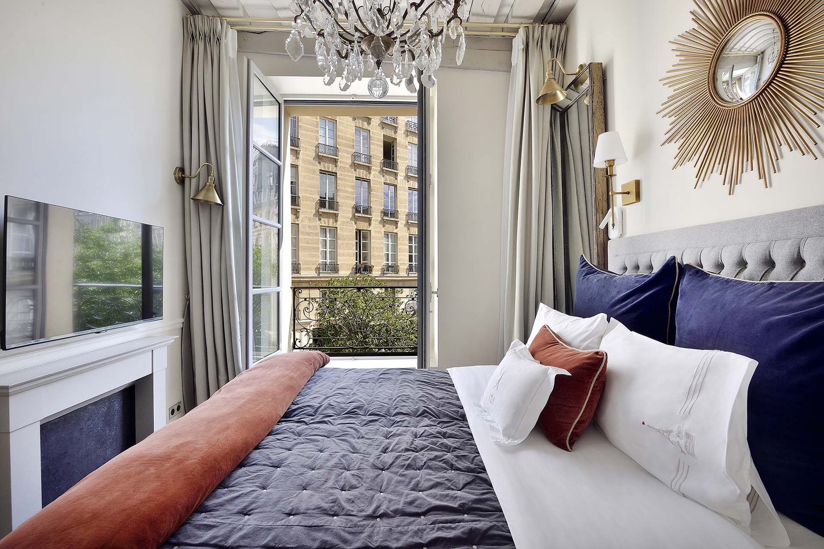 View of the stunning Place Dauphine from the bedroom,