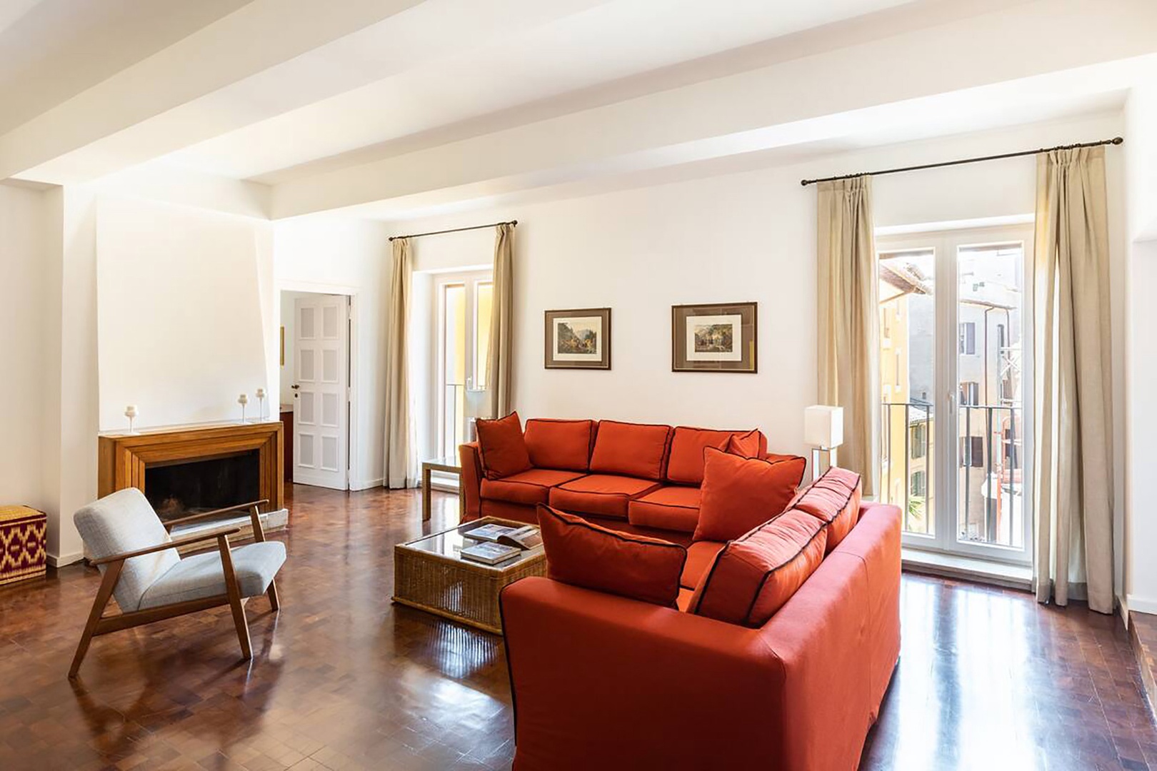 Large French windows in living room bring in lots of light.