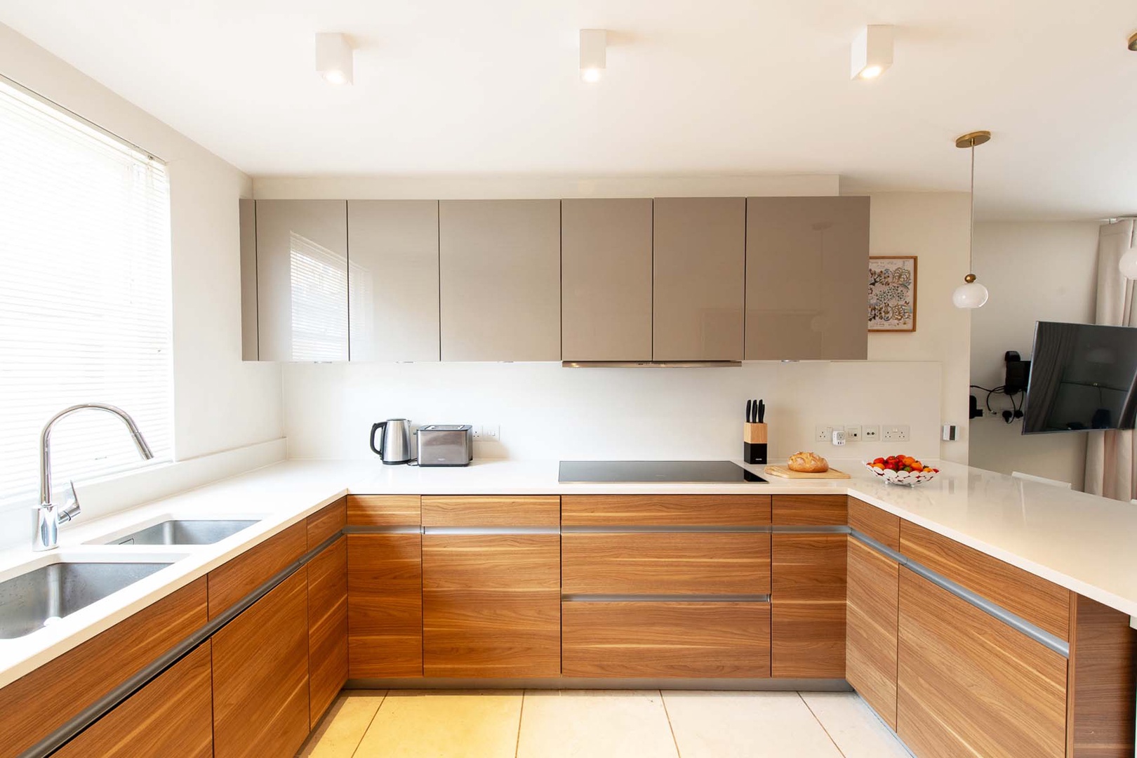 Stunning modern kitchen is fully equipped.