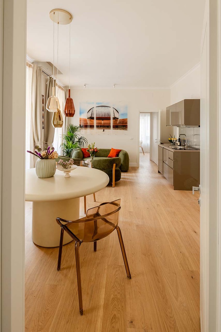 Modern kitchenette is part of the beautifully integrated space.