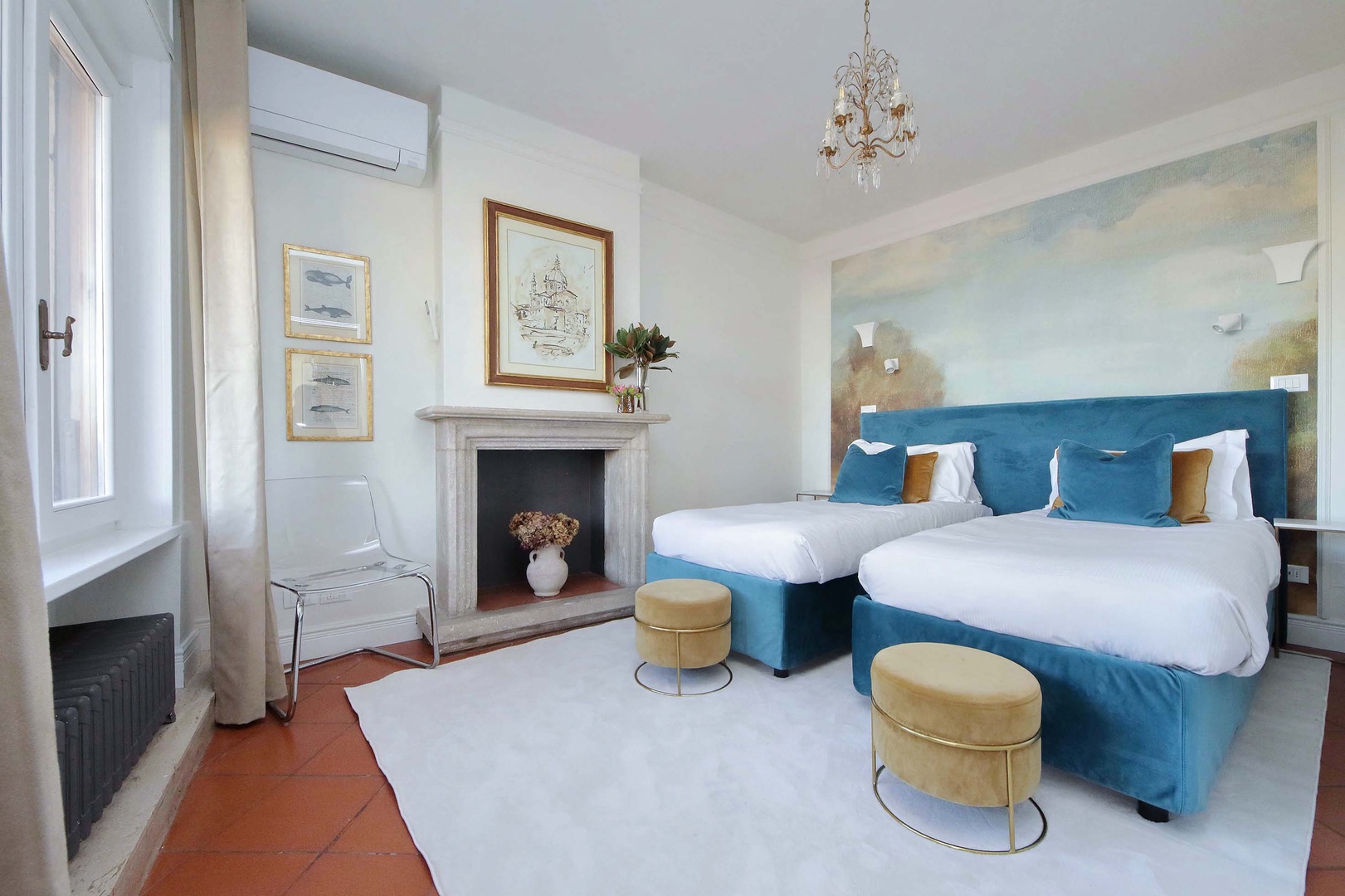 The second bedroom has large windows opening to terrace.