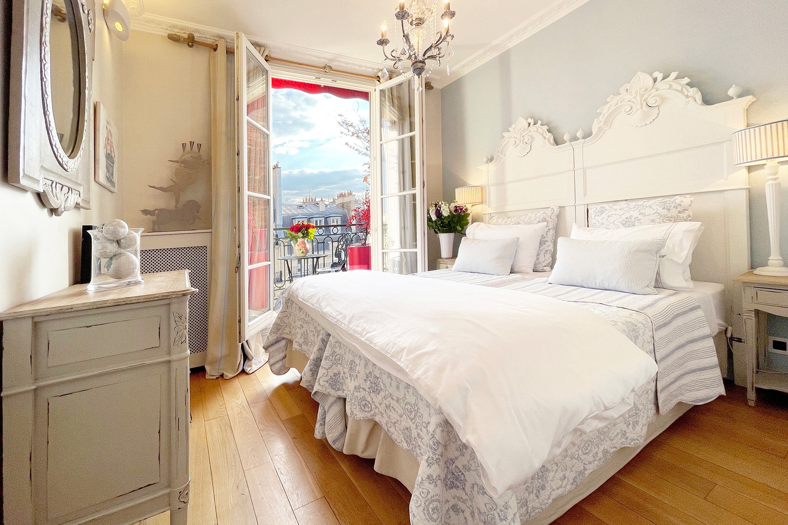 Beautiful bedroom 2 has little balcony.