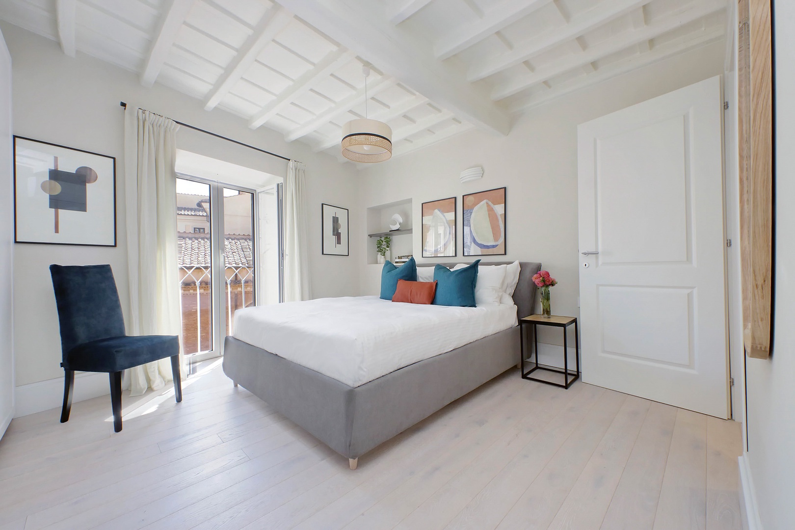 Bright bedroom 1 has lovely light and beamed ceilings.