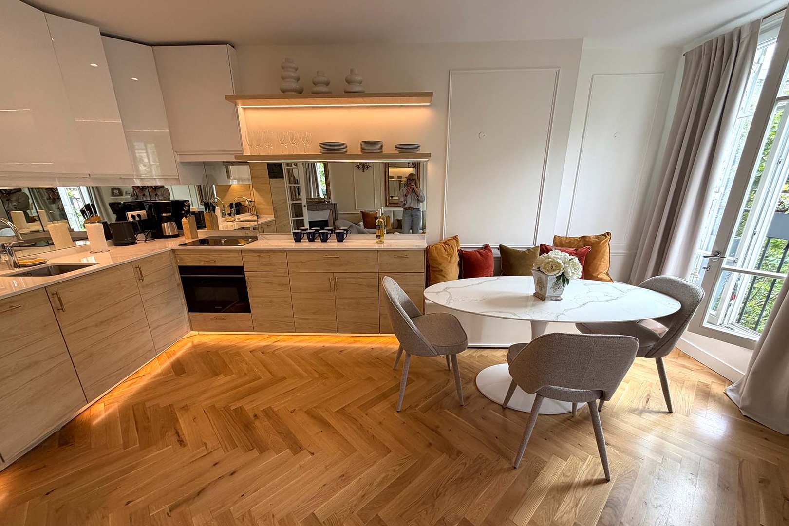 The open-plan kitchen offers lots of counter space and storage.