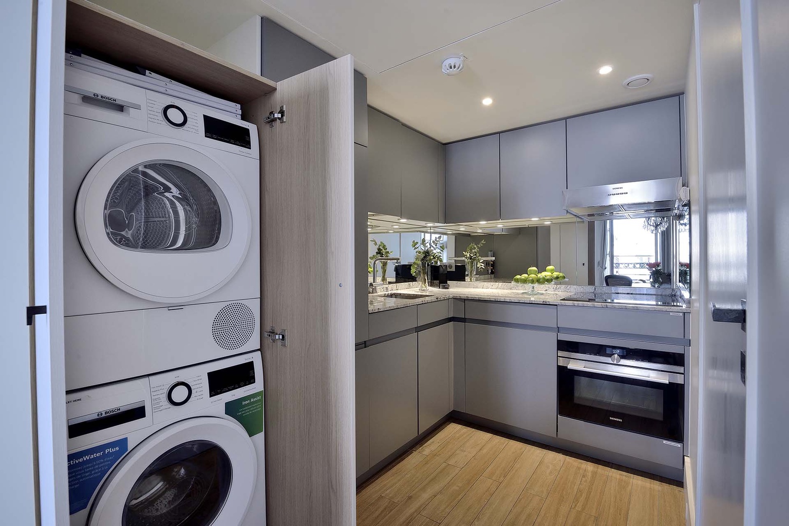 Separate washer and dryer just off the kitchen for convenience.