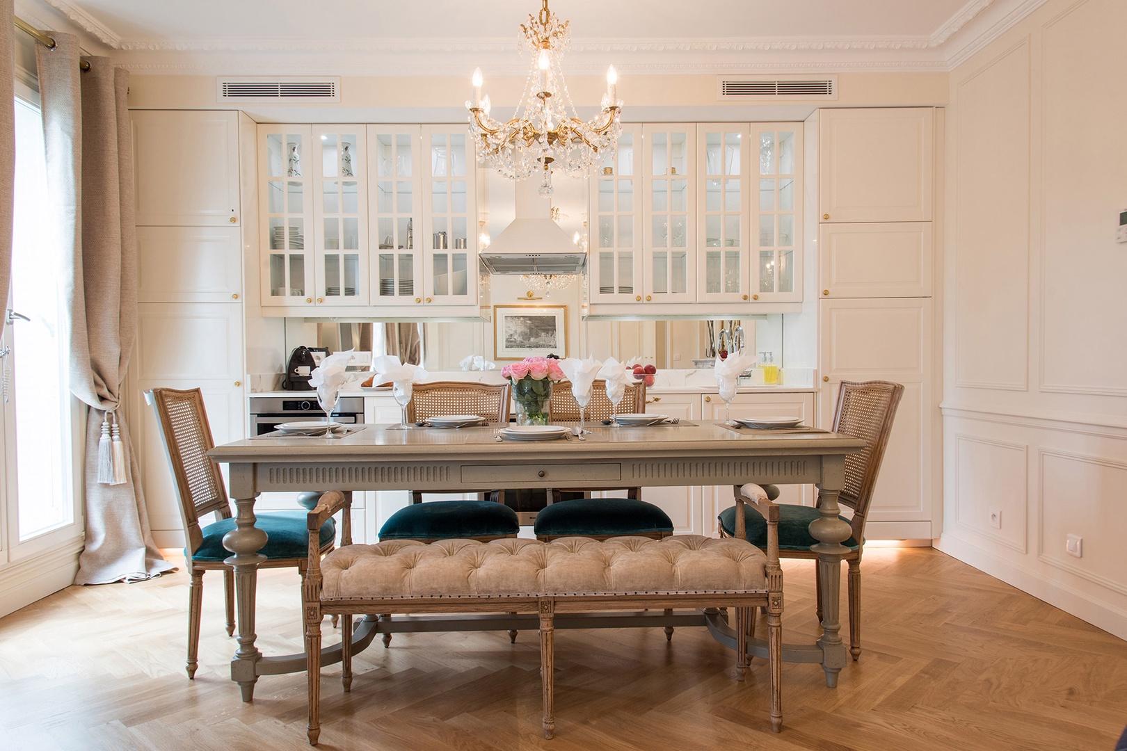The large dining table comfortably seats eight guests.