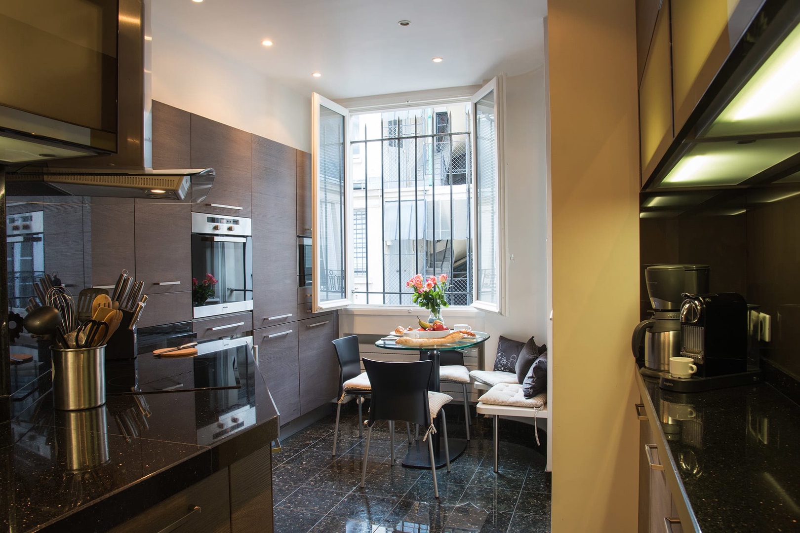 The fully equipped kitchen has a dishwasher and Nespresso machine.