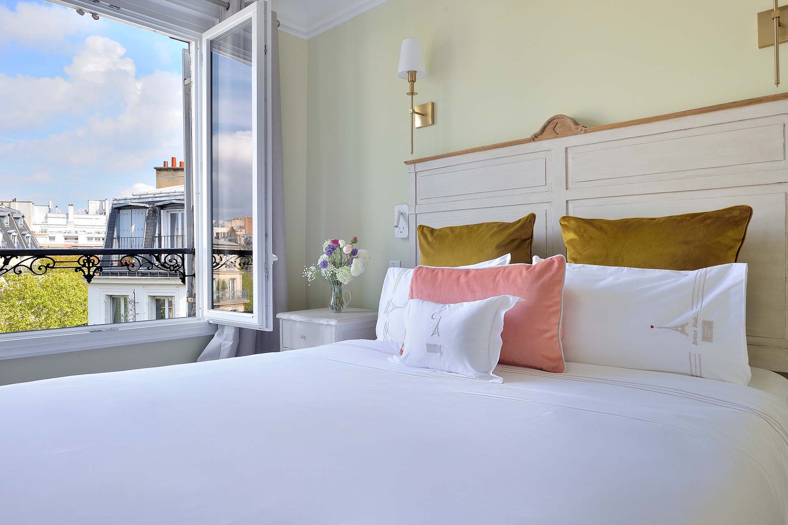 Sunlight streams into the spacious bedroom 1.