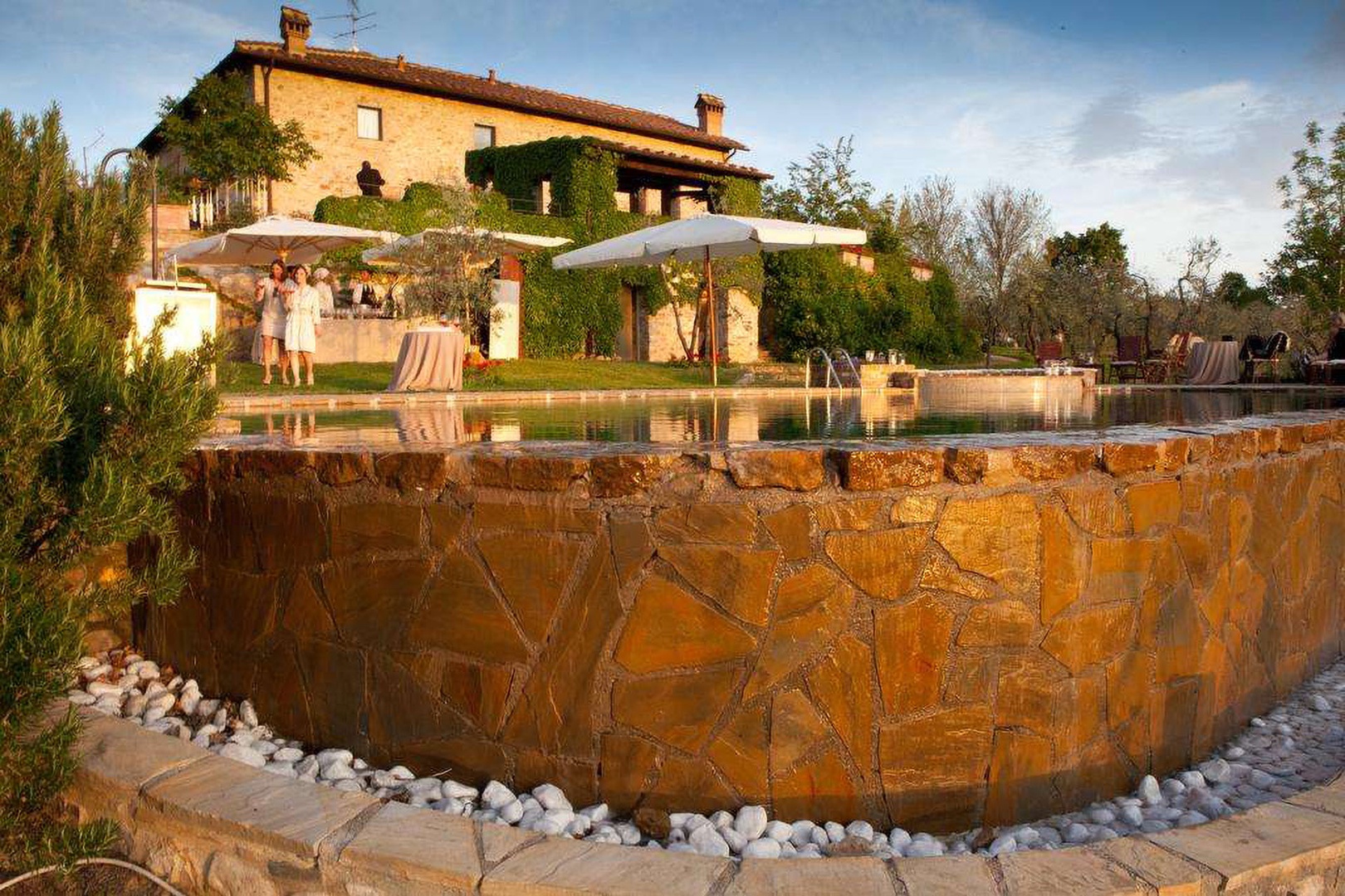 Beautifully designed pool surrounded by stones.