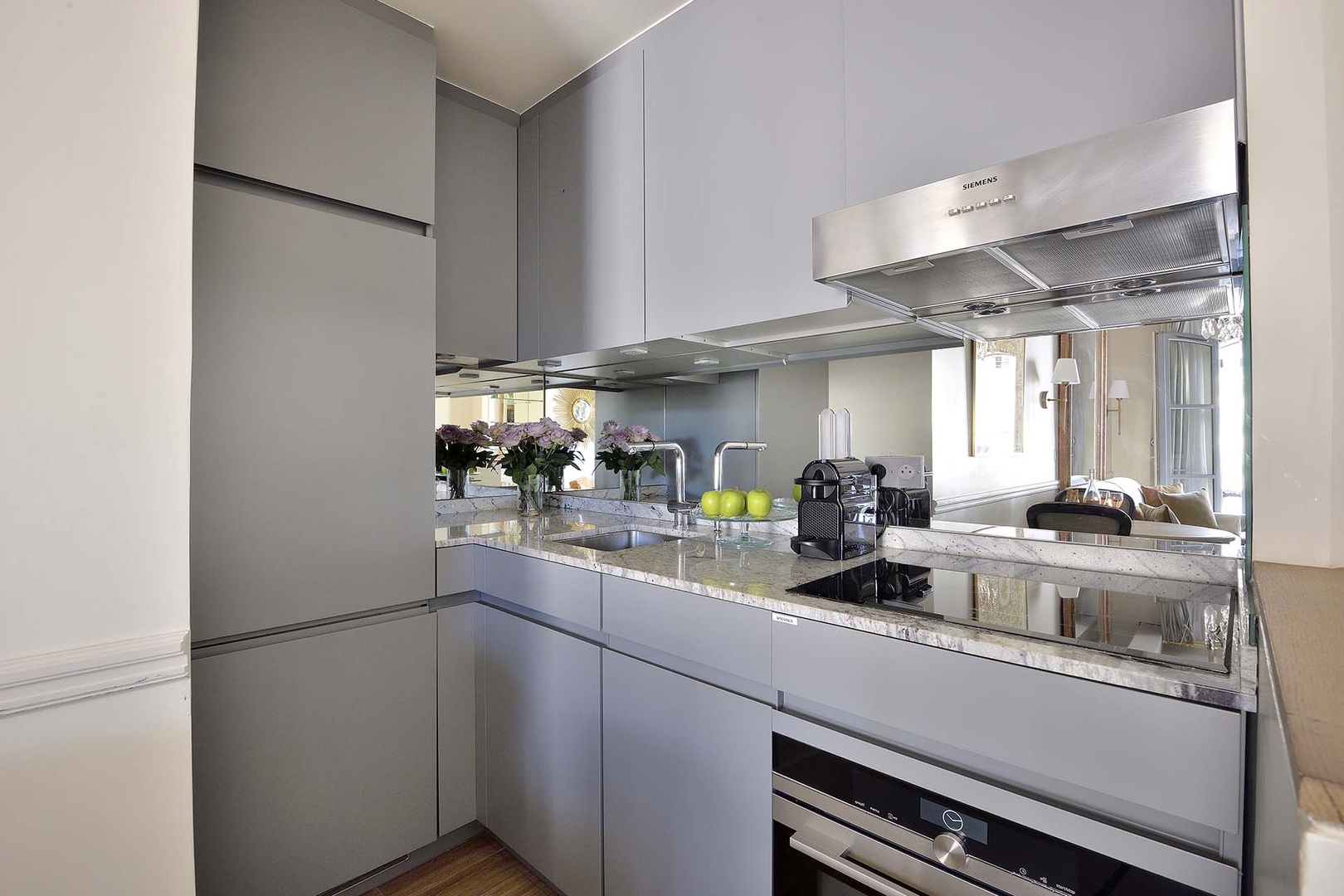 The modern kitchen is equipped with top-of-the-line appliances.