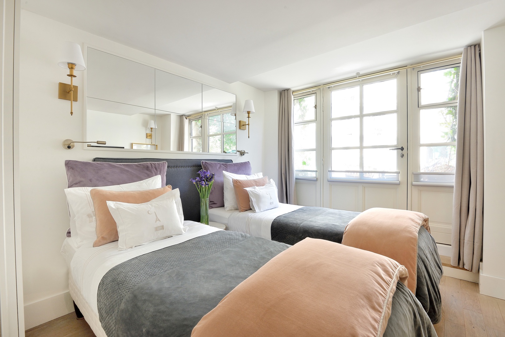 Bedroom 2 has comfortable beds that can be combined or separated.