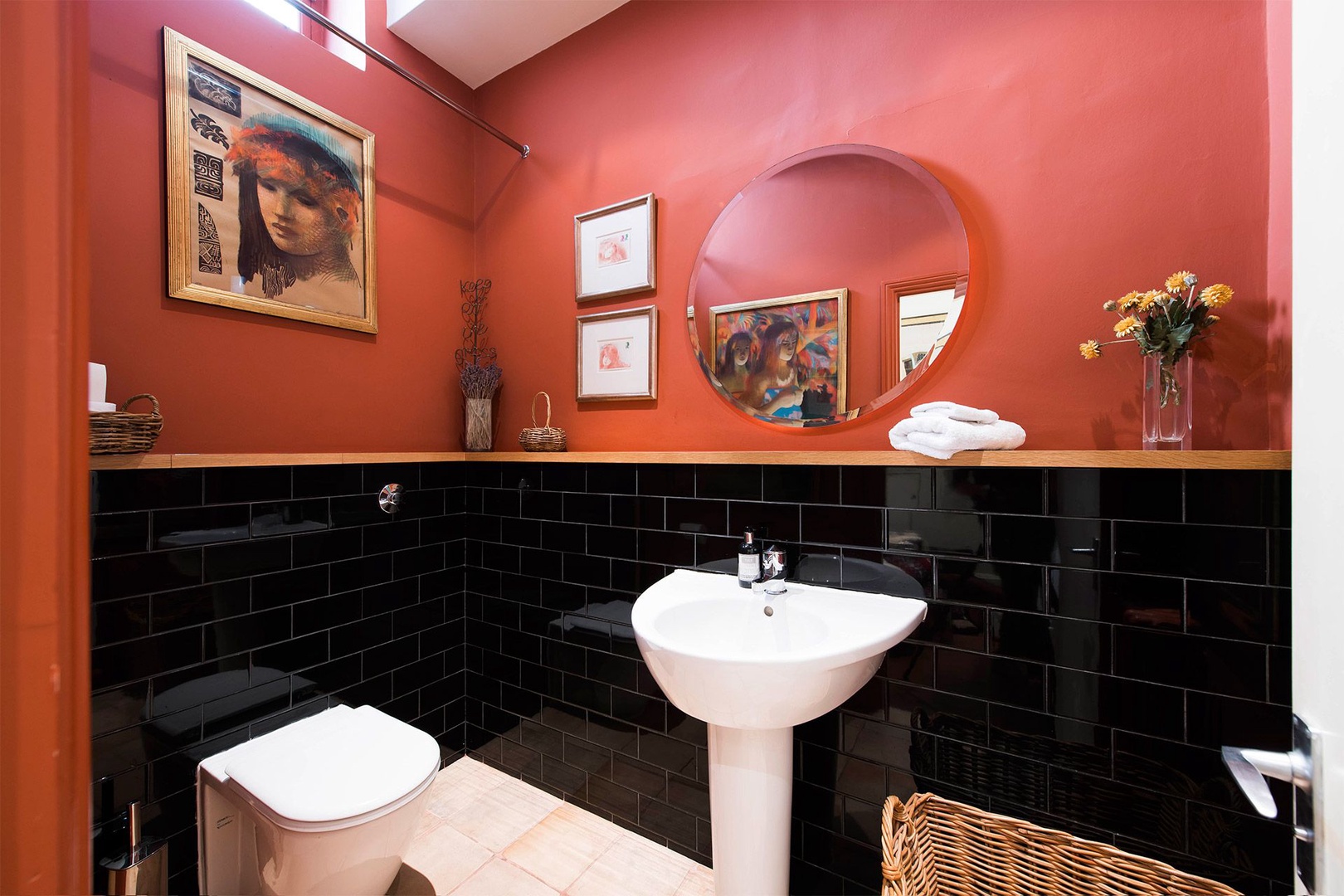 Convenient half bath on the ground floor.