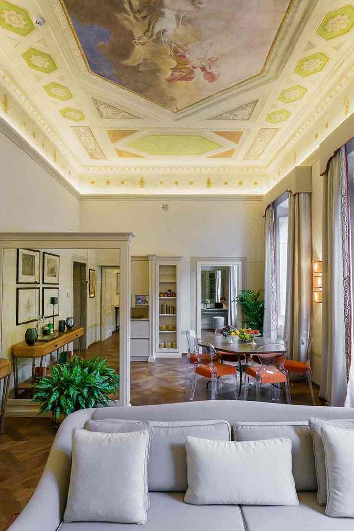 Soaring frescoed ceilings in the living room.