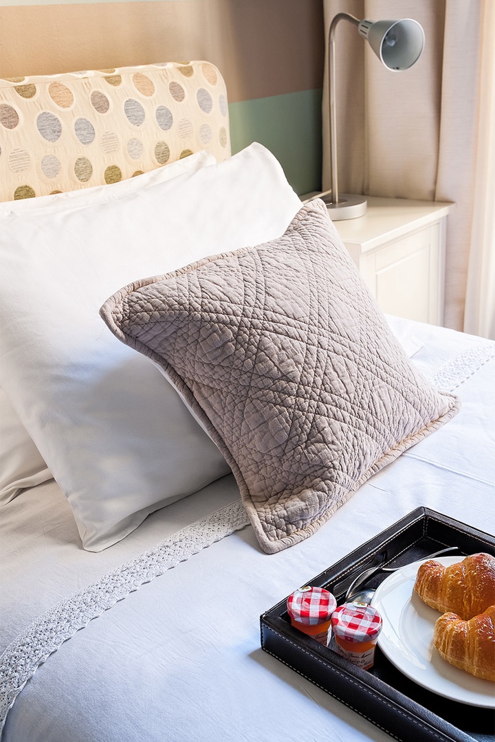 Soft pillows add extra comfort to the beds.