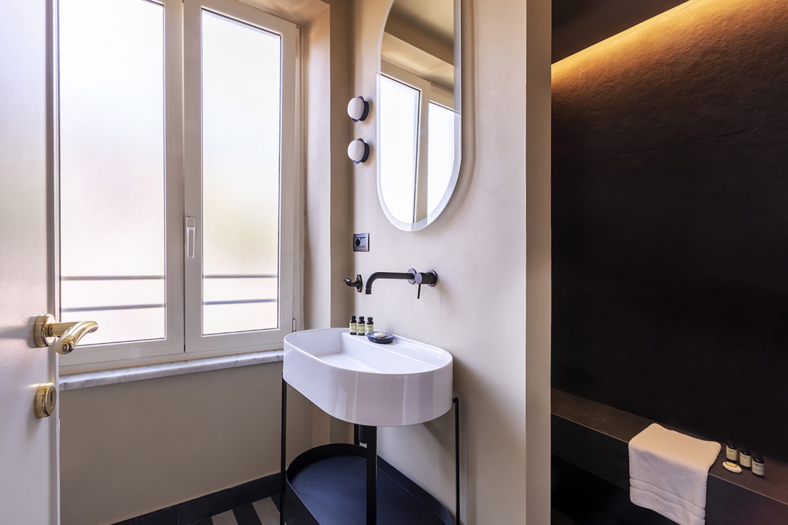 Bathroom 2 has large window and shower.