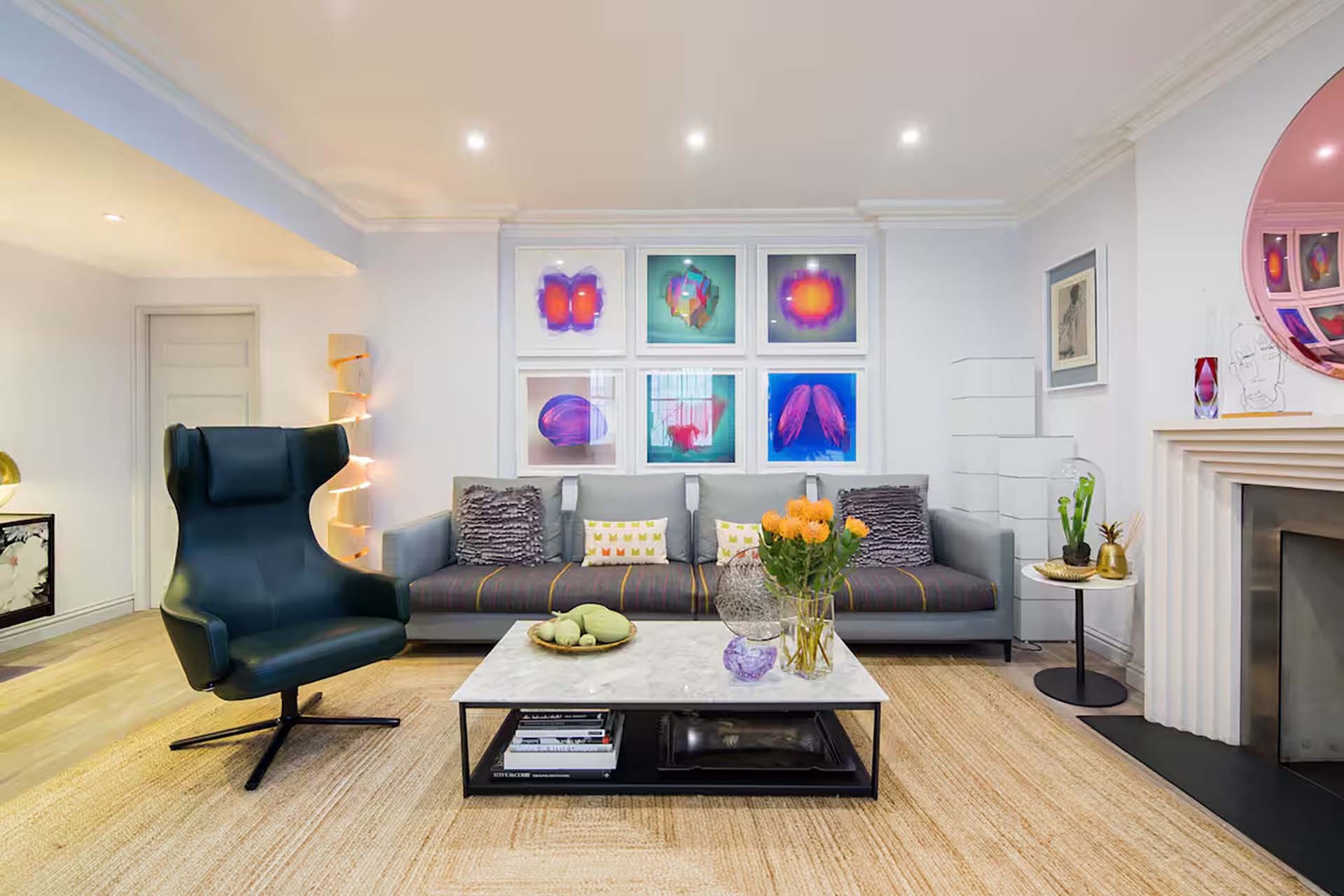 Bright open plan living room with dining area.