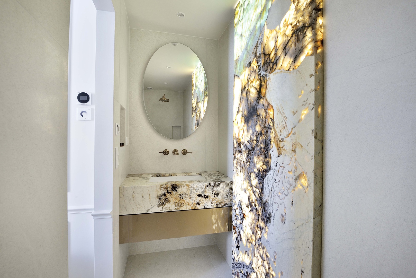 Sumptuous details in both bathrooms.