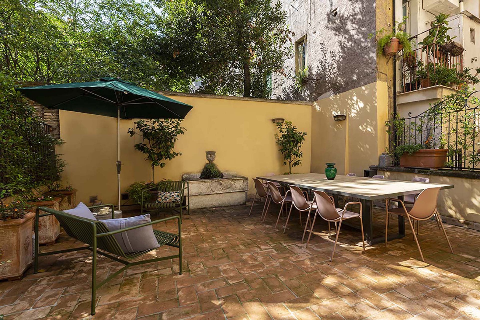 Large private garden terrace perfect for relaxing and dining together.