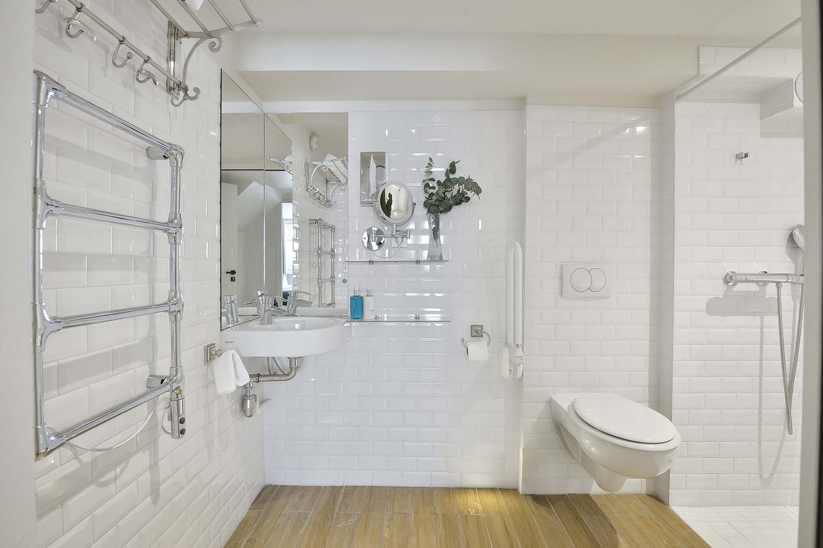 Bathroom 2 is equipped with an open shower.