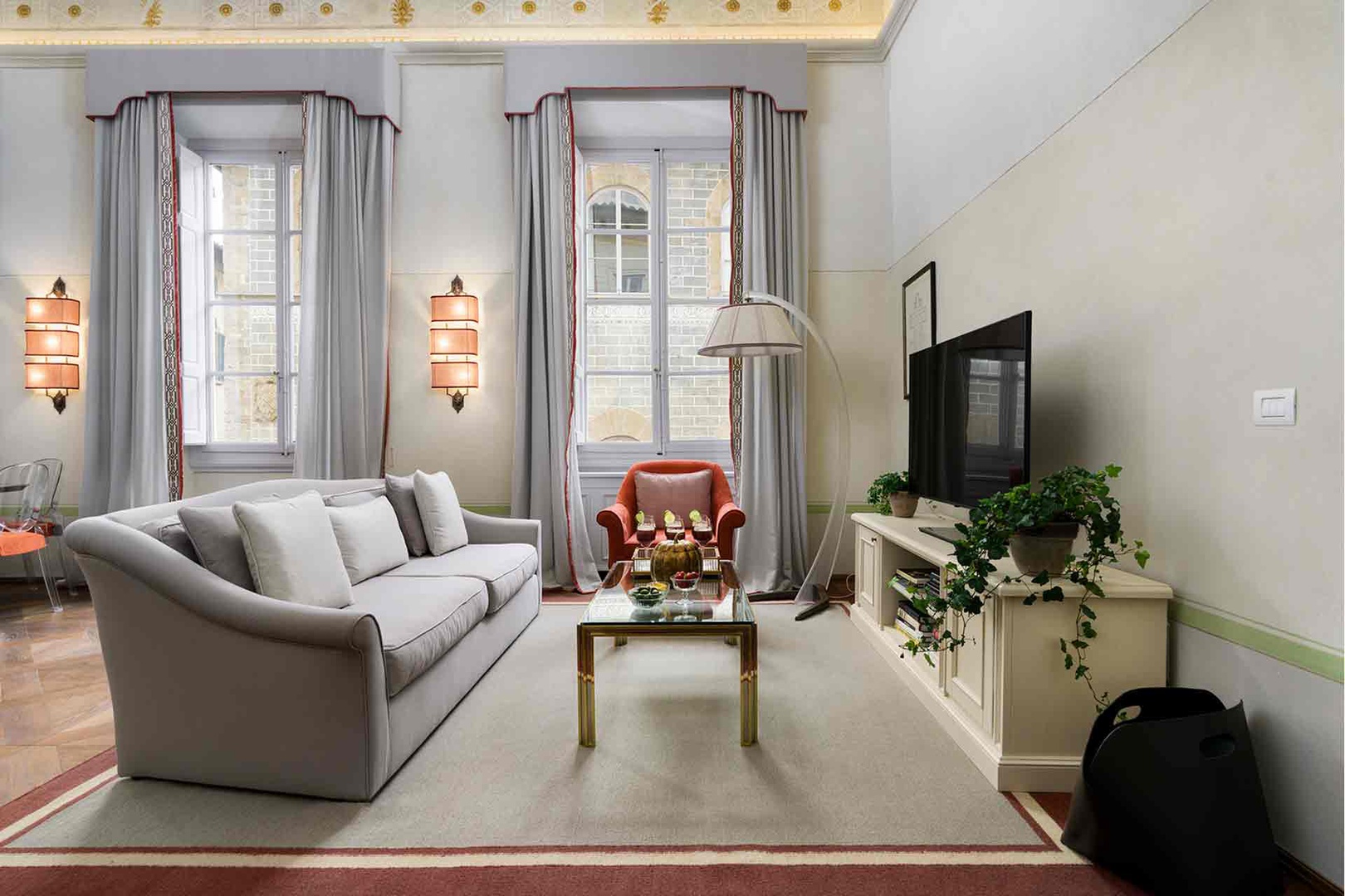 Bright light fills the grand living room.