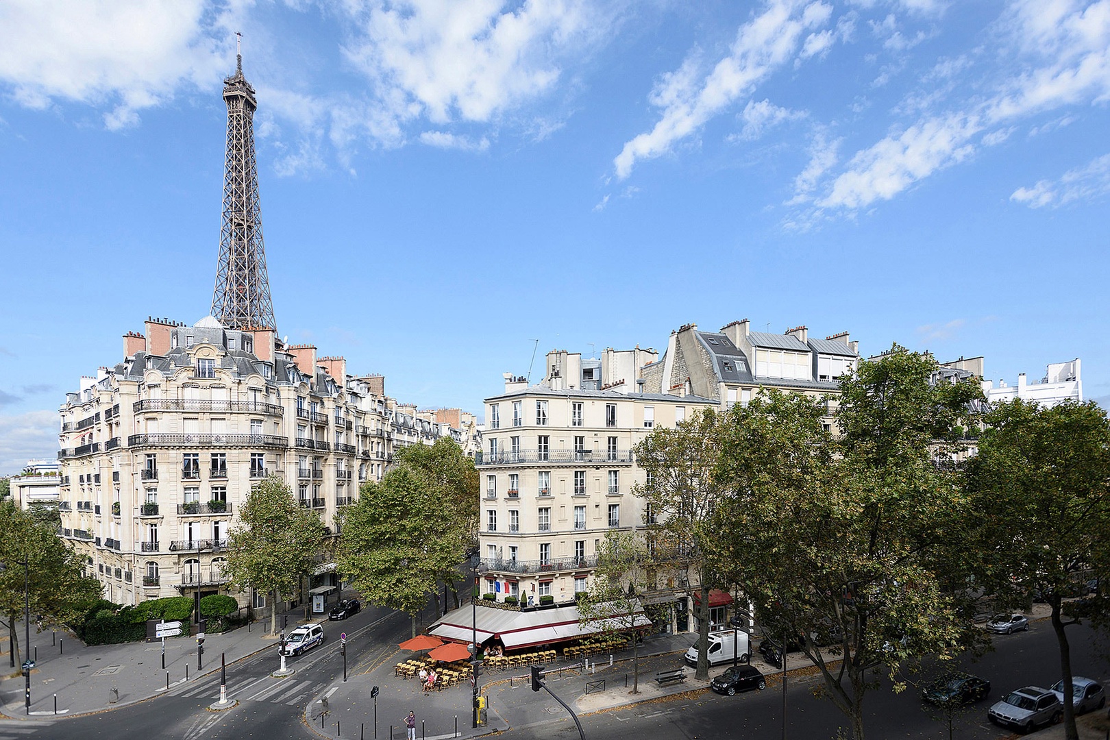 Enjoy stunning views of surrounding buildings and the Eiffel Tower.