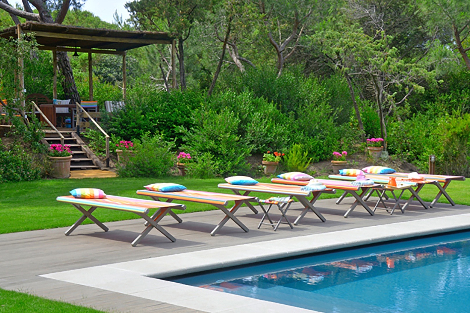 To the left of the pool is a lovely bamboo covered escape, perfect for lunch by the pool.