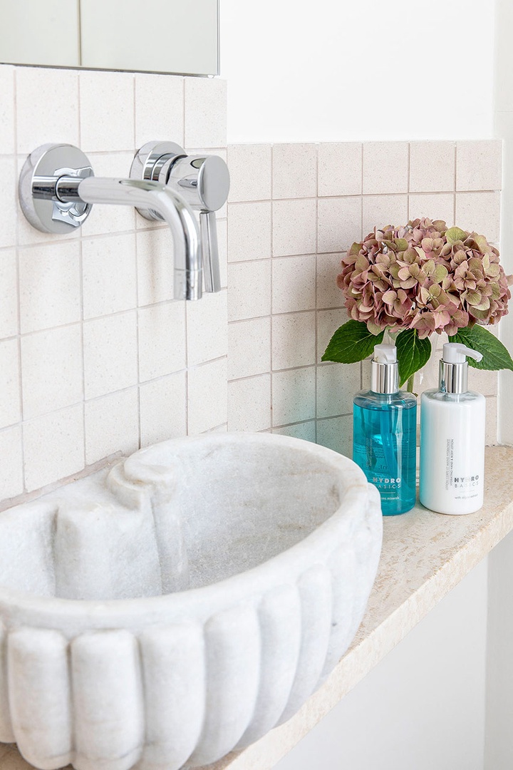 Antique stone sink in the bathroom.