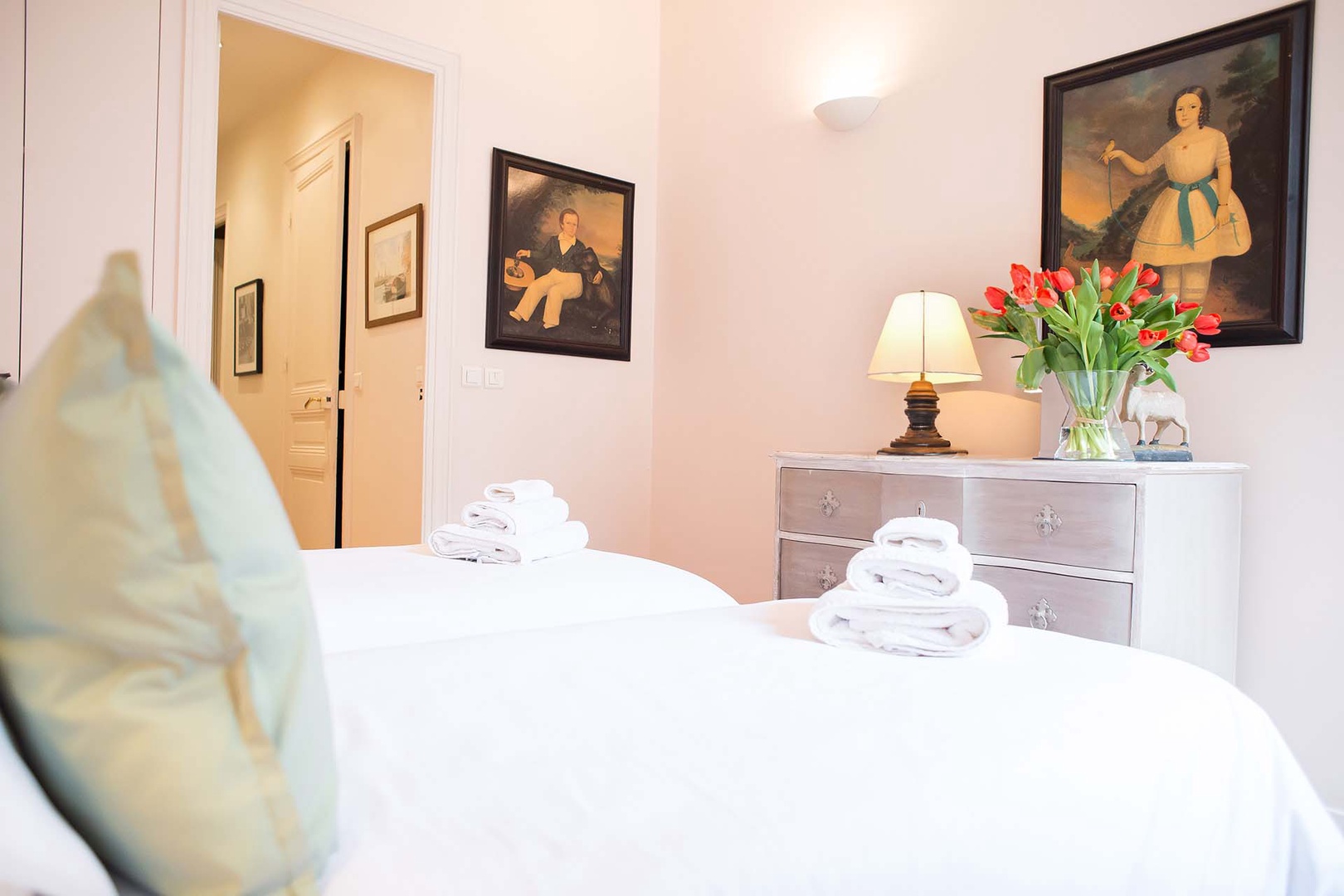 Bedroom 2 comes with two comfortable beds.