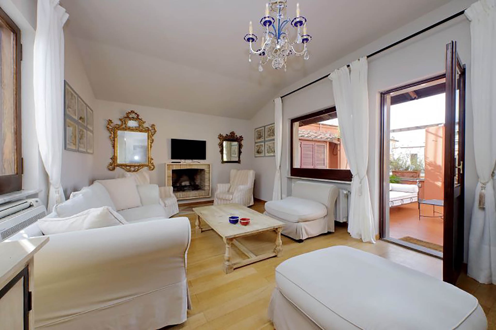 Light filled living room with direct access to the terrace