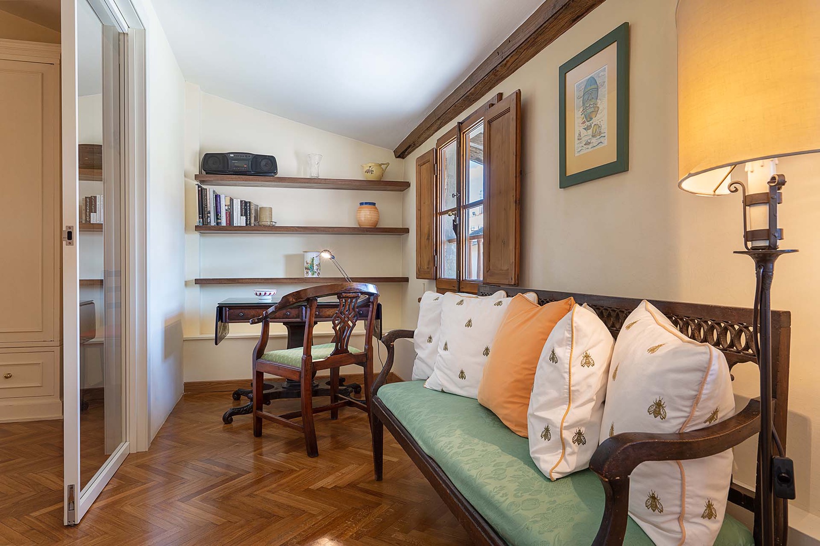 Charming study where you can catch up on correspondence, or work with a great view of the Piazza.