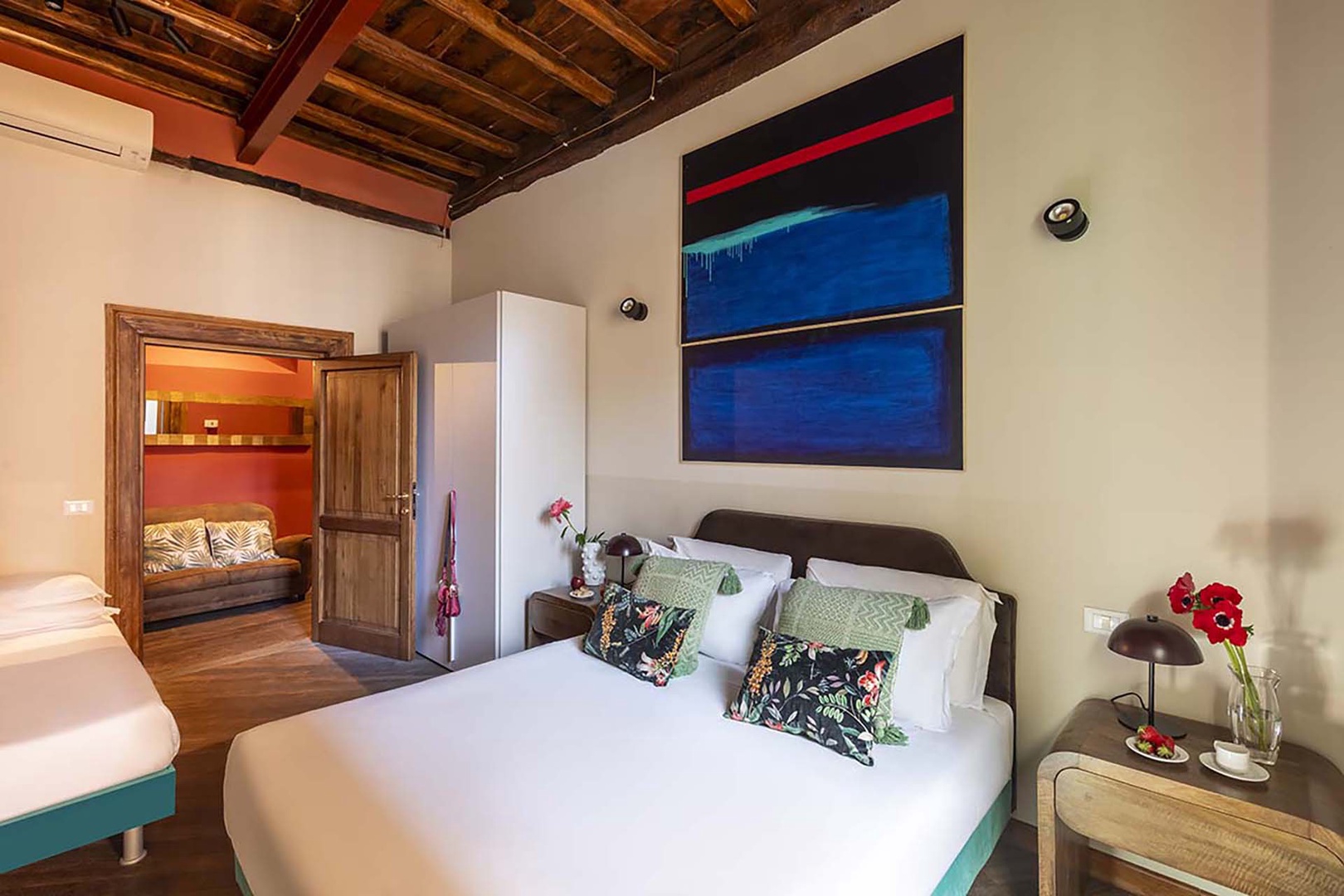 Bedroom 2 has an extra-wide queen bed and single bed.