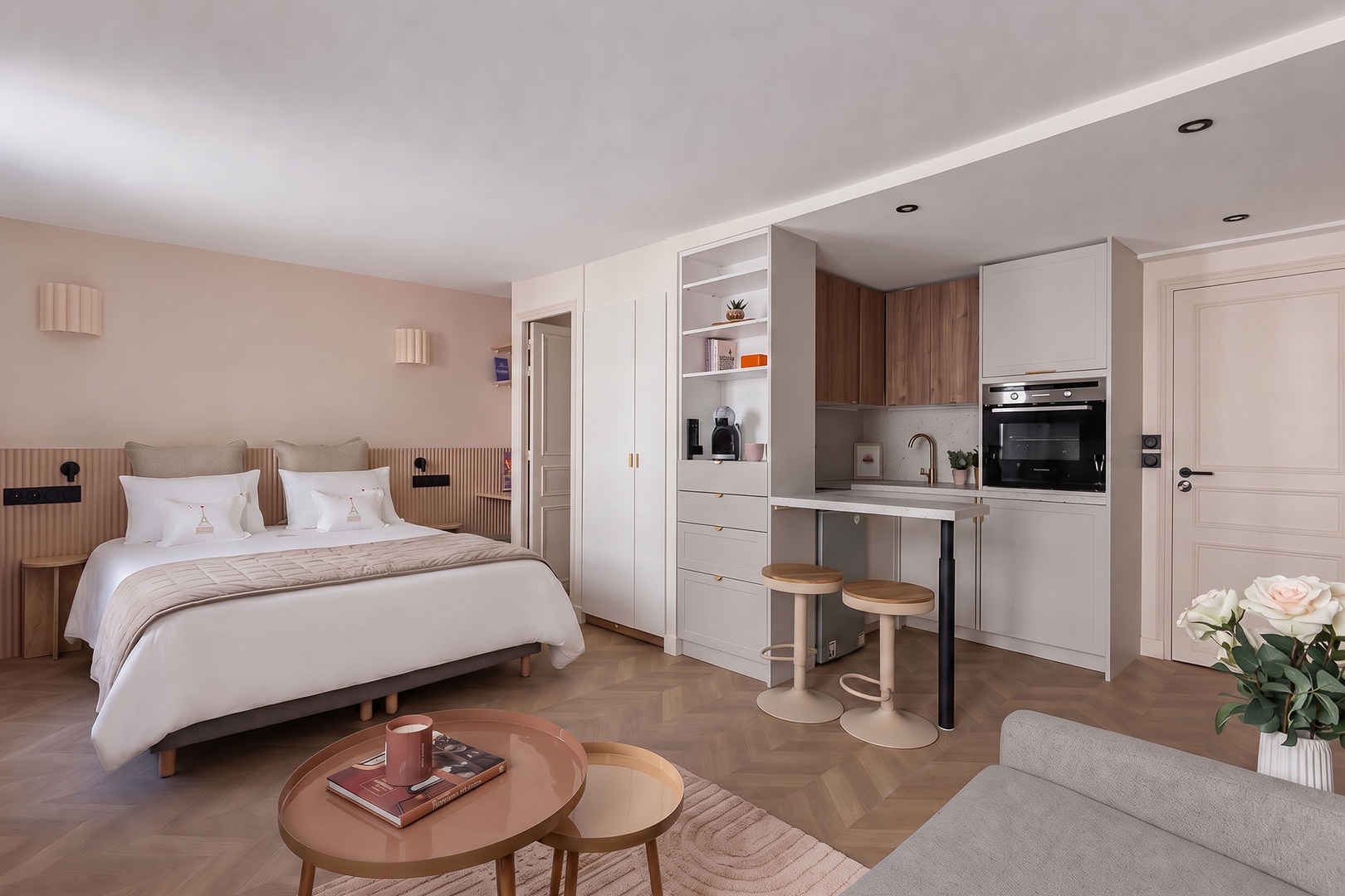 Comfortable bed is located opposite the sofa.