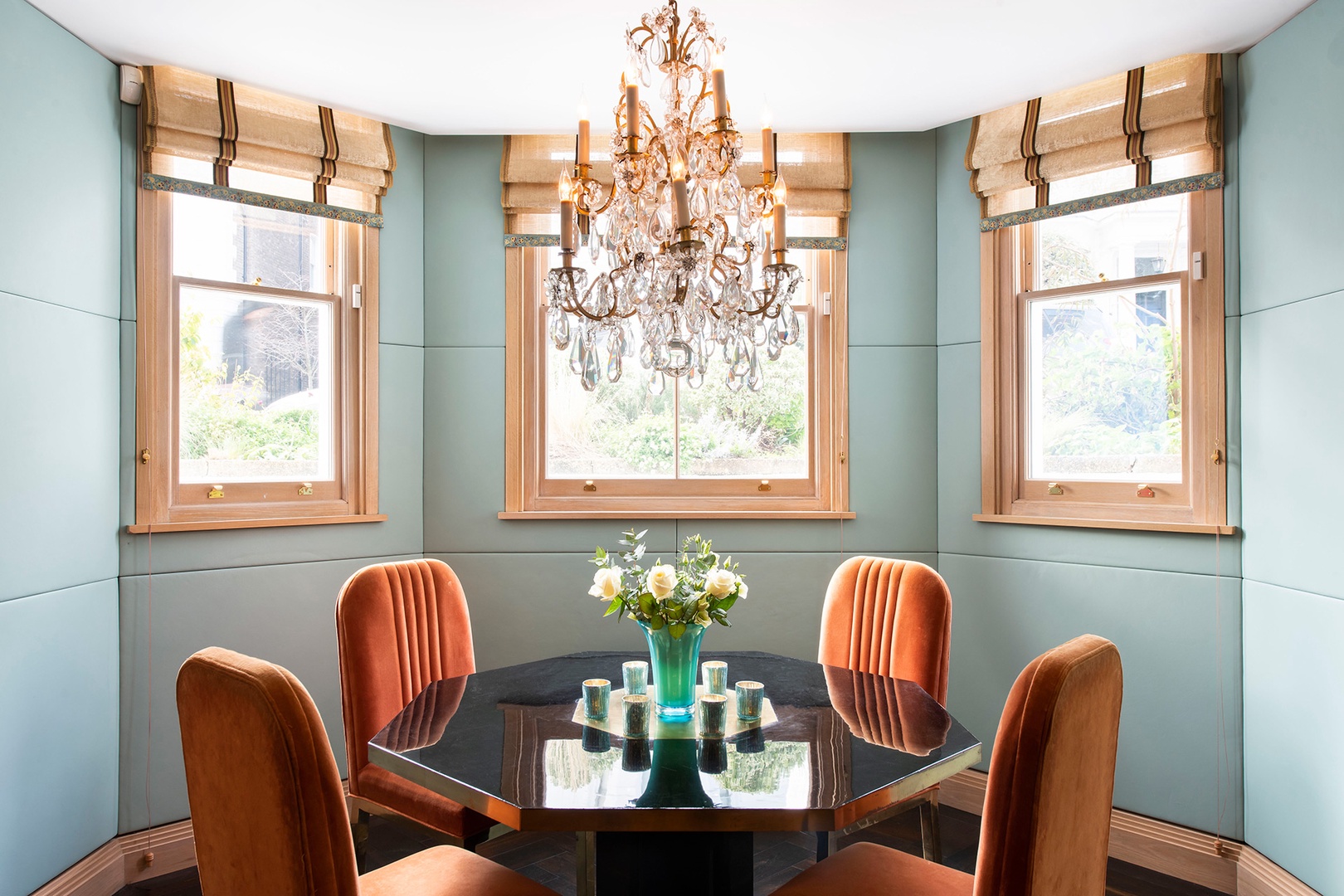 Elegant dining table with chandelier at Phillimore.